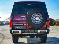 1991 JT1V0LJ7708000216 Medium Red Pearl - Outdoors